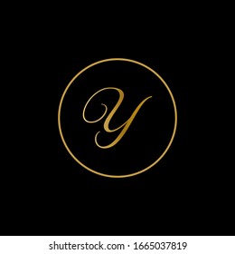 Y letter logo with black background.Gold letter logo.This is gold script letter design.