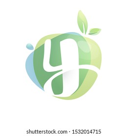 Y letter logo with negative space at green watercolor splash background. Vector elements for organic food labels, ecology presentation, card etc.