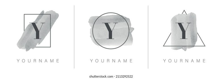 Y letter logo with rectangle, circle and triangle design with watercolor brush stroke in gray tones.