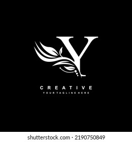 Y letter logo vector design with leaf decoration. monogram Y, typography. feather logo. luxury Y. Y thrives. suitable for logo of business, company, product, boutique, wedding, hotel, etc