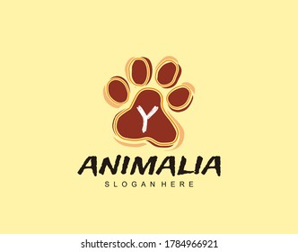 Y Letter in Paw Shape Design. Pet logo design. Dog, Cat, animal clinic, pet care center. Paw vector logo Icon Template.