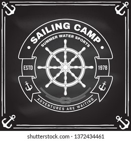 Yacht club badge. Vector illustration on the chalkboard. Concept for shirt, print, stamp or tee. Vintage typography design with black sea anchor , steering hand wheel ship and rope knot silhouette