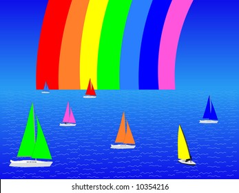 Yates con velas coloridas en el océano con arco iris