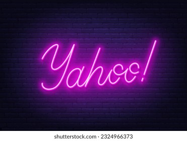 Yahoo neon sign on brick wall background.