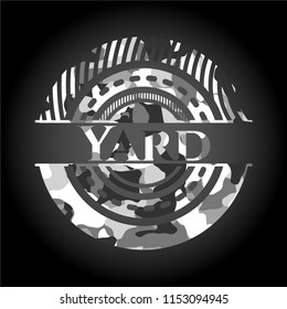 Yard written on a grey camouflage texture