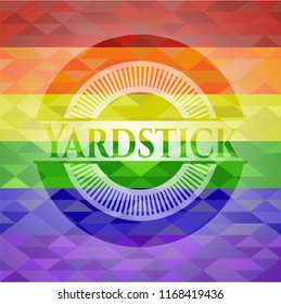 Yardstick on mosaic background with the colors of the LGBT flag