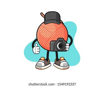Yarn ball photographer cartoon. Mascot Character vector.