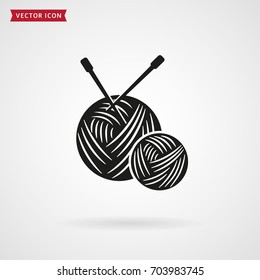 Yarn balls with knitting needles icon. Needlework and handmade concept. Vector symbol isolated on white background. 