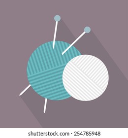 Yarn balls with needles icon. Flat design. Vector illustration