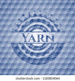 Yarn blue emblem or badge with abstract geometric pattern background.