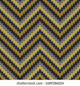 Yarn zigzag chevron stripes christmas knit geometric seamless pattern. Jumper knit effect ornament. Nordic style seamless knitted pattern. Repeatable background.