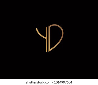 YD initial heart shape gold colored logo