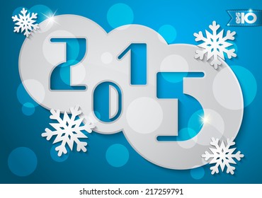 Year 2015 in a circles of paper on an abstract blue background