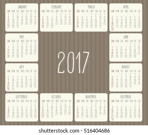 Year 2017 vector monthly calendar with hand drawn text over brown striped background. Week starting from Sunday.