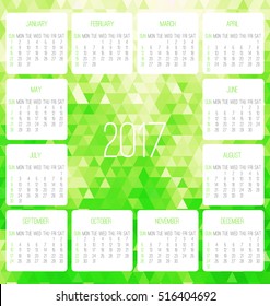 Year 2017 vector monthly calendar. Week starting from Sunday. Contemporary low poly design in vibrant green color.
