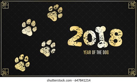 The year 2018 is a yellow earth dog. Golden traces in grunge style on a black background with a pattern. Chinese New Year. Cover for the project. Vector illustration