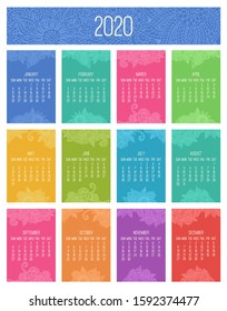 Year 2020 vector monthly calendar over lacy doodle ornate hand drawn colorful background. Week starting from Sunday.