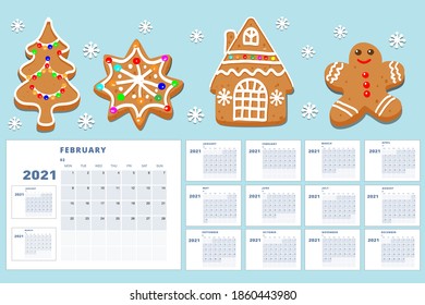 Year 2021 calendar template. Christmas cookies on a blue background
