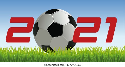The year 2021 with a soccer ball placed on the lawn of a field to symbolize the launch of the new competitive season.