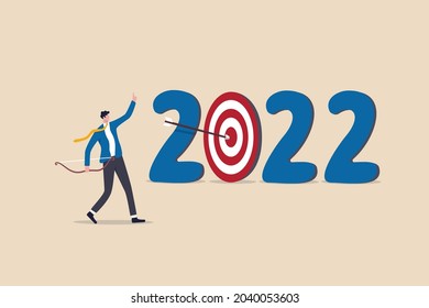 Year 2022 business target or personal development goal, new year resolutions, success plan or career achievement concept, ambitious businessman shoot arrow at target bullseye of year 2022 number.