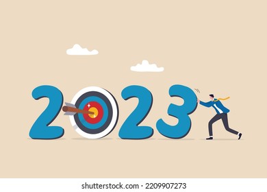 Year 2023 business target, new year resolution or challenge to achieve goal, aim for business success, growth or motivation to succeed concept, businessman changing year to 2023 target.