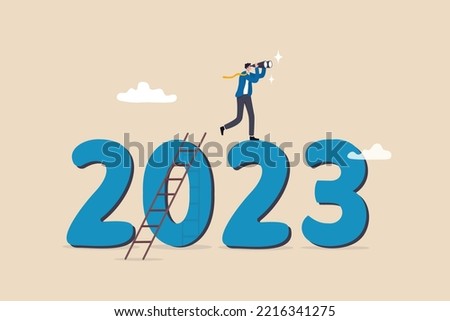 Year 2023 outlook, economic forecast or future vision, business opportunity or challenge ahead, year review or analysis concept, confidence businessman with binoculars climb up ladder on year 2023.