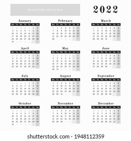 Year calendar 2022 in a square size black and white design with a space for copy or logo with a mondays as a first days in week