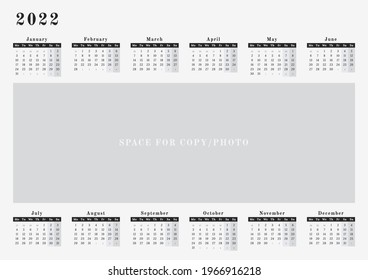 Year calendar 2022 in a wall horizontal format, black and white design with a space for copy or logo with mondays as a first day in week