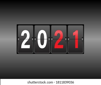 Year change on the calendar counter. The new year 2021 is coming. White and red numbers, black gradient background.