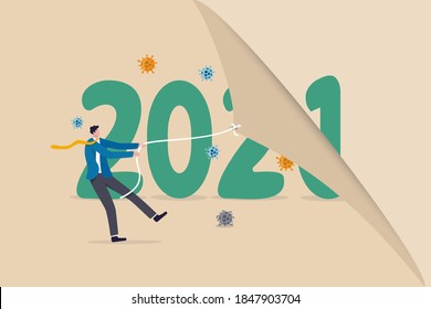 Year changing to 2021 from 2020 Coronavirus COVID-19 outbreak, the worst year of world health care and economic concept, man pulling to change calendar healthy new year with coronavirus pathogen.