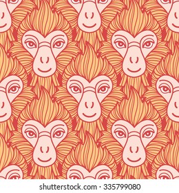 Year of the fire or red monkey 2016 seamless vector pattern. Chinese zodiac symbol. Colorful repeating monkey heads with fire looking hair. New Year background. Red and orange colors.