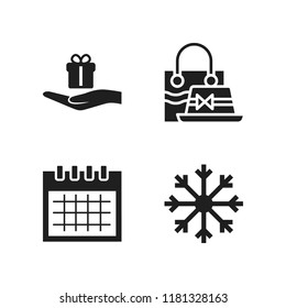 year icon. 4 year vector icons set. hand holding a gift, snowflake and hat icons for web and design about year theme