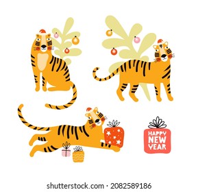 Year of the Tiger. Cute cartoon tiger in a Santa hat.  Funny animals with a Christmas tree and gift boxes. Happy New Year and Christmas. Vector collection isolated on white. Child flat illustration