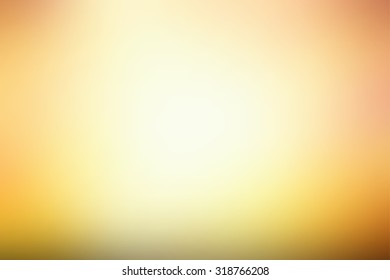 Yellow abstract smooth blur background for any design to put over.