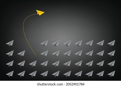 Yellow airplane changing direction. New idea, change, trend, courage, creative solution, innovation and unique way concept. Think differently concept.