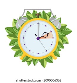 Yellow alarm clock moving forward in one hour with green leaves on background. Spring clock change concept.
