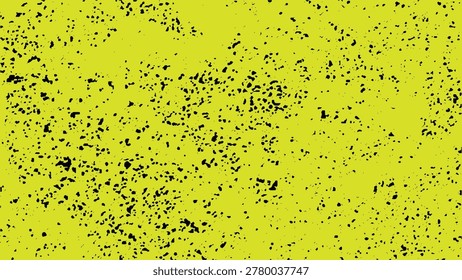 Yellow background with black spots and splatters texture pattern