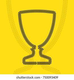 Yellow background with cup and tire track stroke