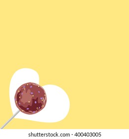 Yellow background with a sweet cake pop on a corner