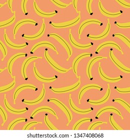 Yellow banana seamless pattern. Fresh fruit on light orange background.