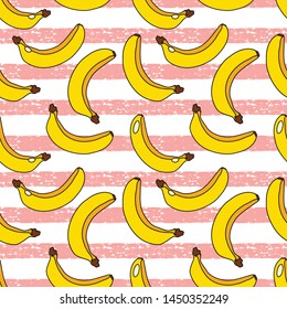 Yellow bananas pattern on pink striped background. 