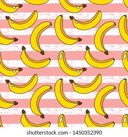 Yellow bananas pattern on pink striped background. 
