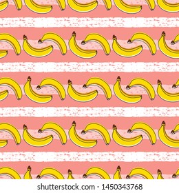 Yellow bananas pattern with pink striped background. 