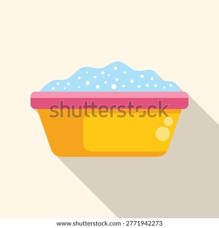 Yellow basin full of water with soap suds for washing clothes, side view