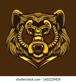 yellow bear head with gold ornamental mask on face 