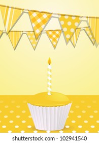 Yellow birthday cupcake with bunting flags