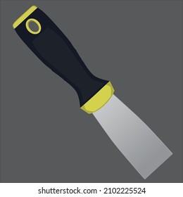 yellow and black spatula on white background