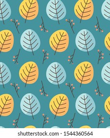 yellow and blue leaves against a dark background with red berries on a twig
