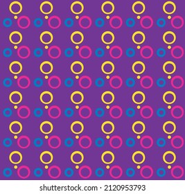 Yellow, blue and pink circles pattern on the purple background. Vector illustration.