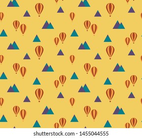 Yellow, Blue, Purple, and Red Fun Children's Seamless, Repeating Pattern with Mountains and Hot Air Balloons